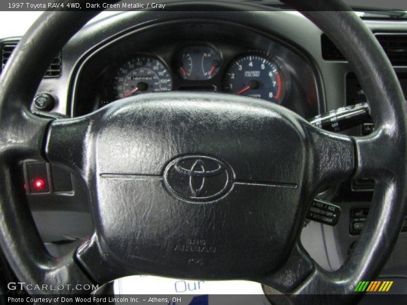 Dark Green Metallic / Gray 1997 Toyota RAV4 4WD