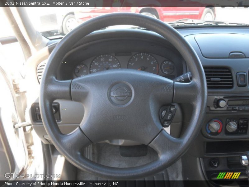 Molten Silver / Stone 2002 Nissan Sentra GXE