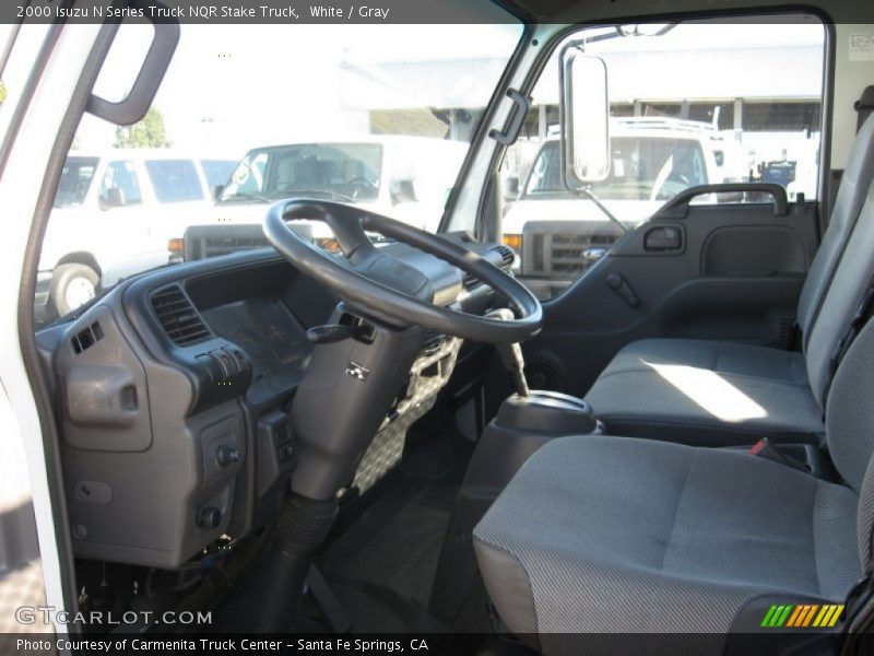 White / Gray 2000 Isuzu N Series Truck NQR Stake Truck