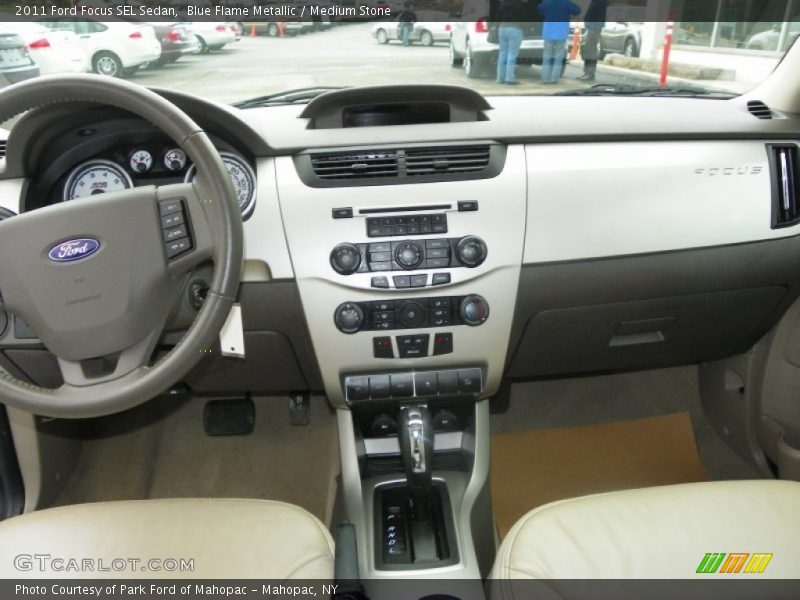 Blue Flame Metallic / Medium Stone 2011 Ford Focus SEL Sedan