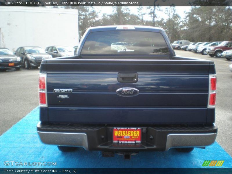 Dark Blue Pearl Metallic / Stone/Medium Stone 2009 Ford F150 XLT SuperCab
