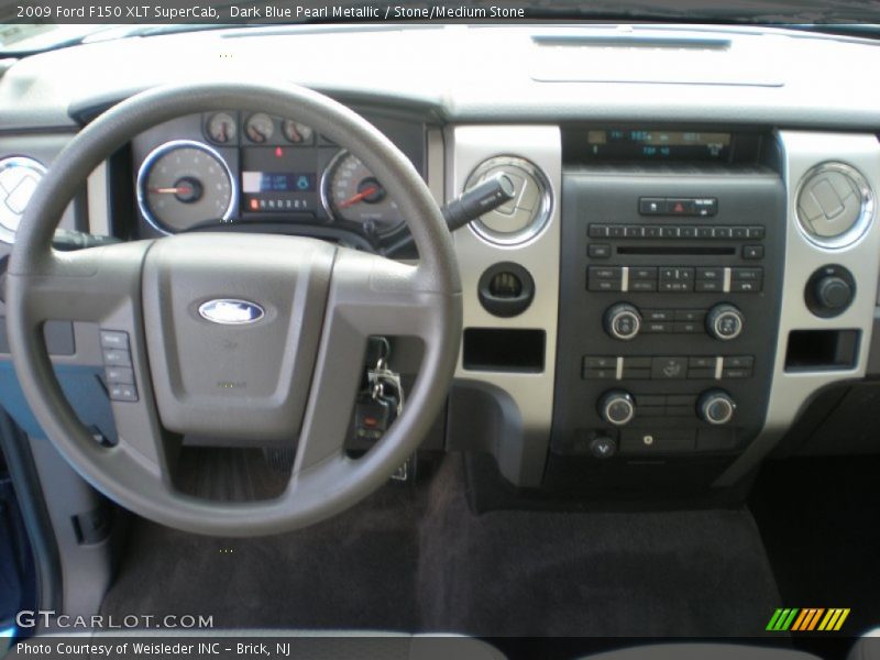 Dark Blue Pearl Metallic / Stone/Medium Stone 2009 Ford F150 XLT SuperCab