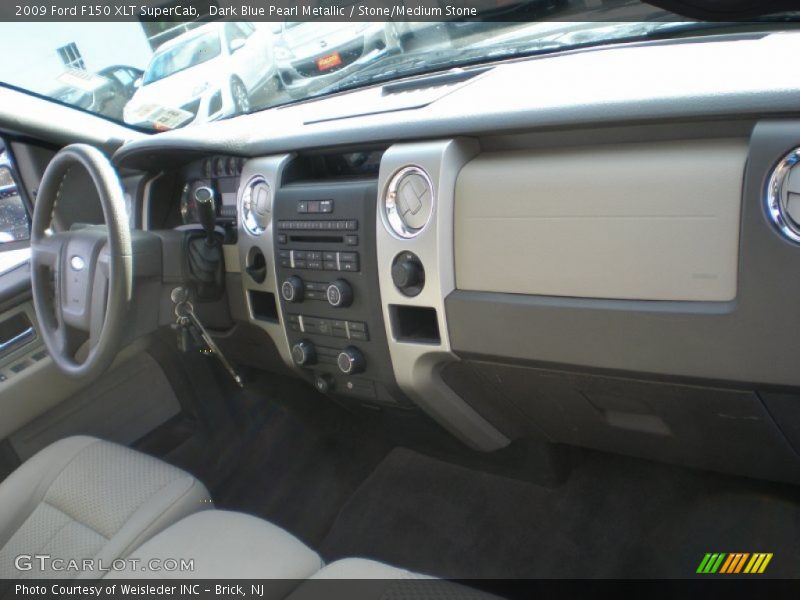Dark Blue Pearl Metallic / Stone/Medium Stone 2009 Ford F150 XLT SuperCab