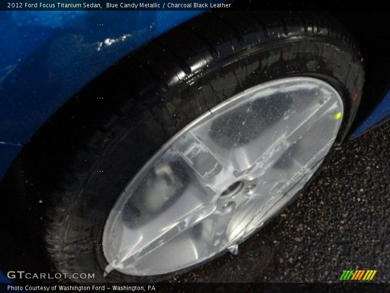 Blue Candy Metallic / Charcoal Black Leather 2012 Ford Focus Titanium Sedan