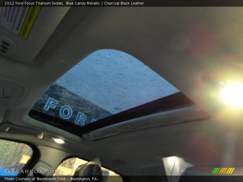 Blue Candy Metallic / Charcoal Black Leather 2012 Ford Focus Titanium Sedan