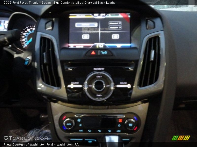 Blue Candy Metallic / Charcoal Black Leather 2012 Ford Focus Titanium Sedan