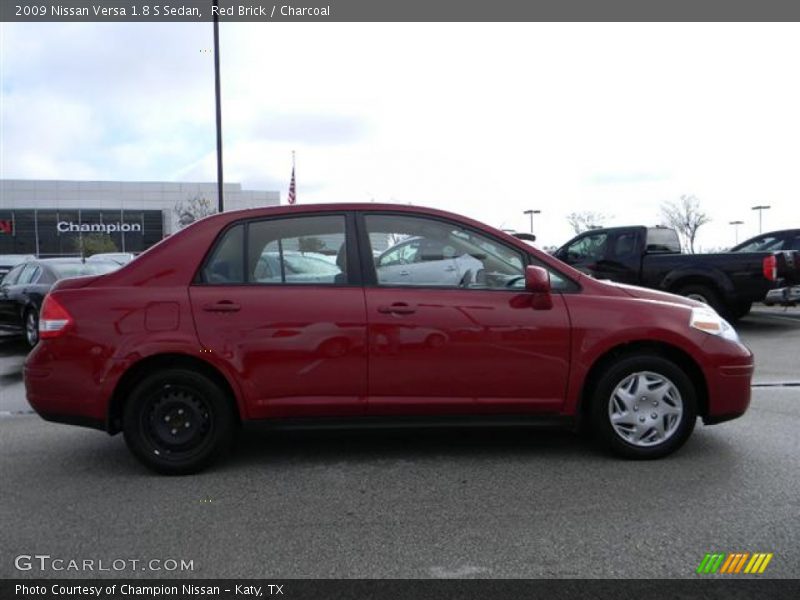 Red Brick / Charcoal 2009 Nissan Versa 1.8 S Sedan