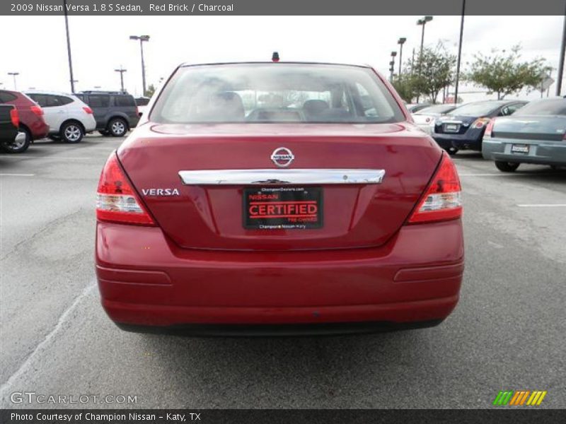 Red Brick / Charcoal 2009 Nissan Versa 1.8 S Sedan