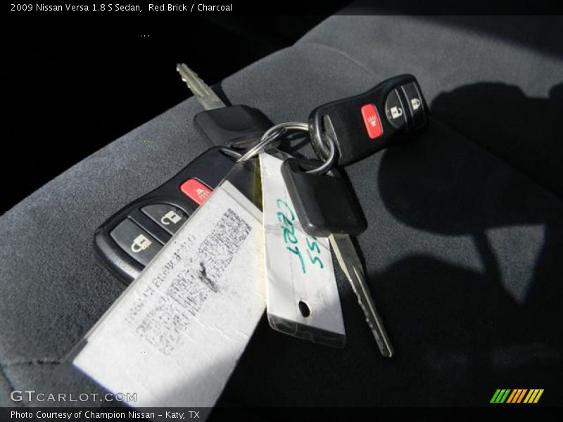 Red Brick / Charcoal 2009 Nissan Versa 1.8 S Sedan