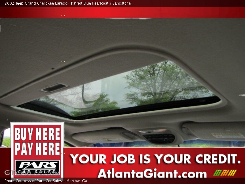 Patriot Blue Pearlcoat / Sandstone 2002 Jeep Grand Cherokee Laredo