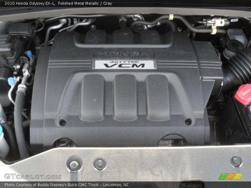 Polished Metal Metallic / Gray 2010 Honda Odyssey EX-L