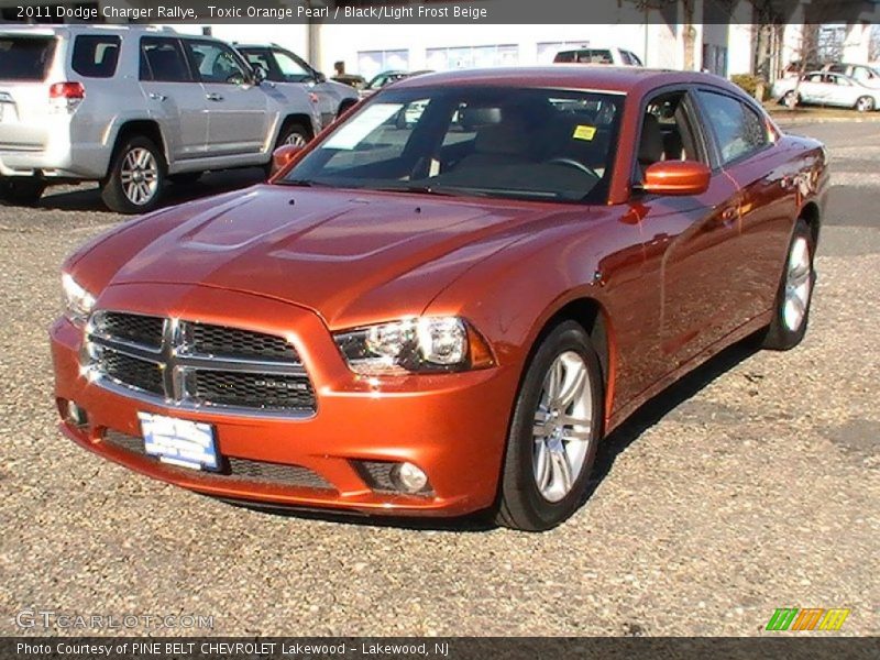 Toxic Orange Pearl / Black/Light Frost Beige 2011 Dodge Charger Rallye