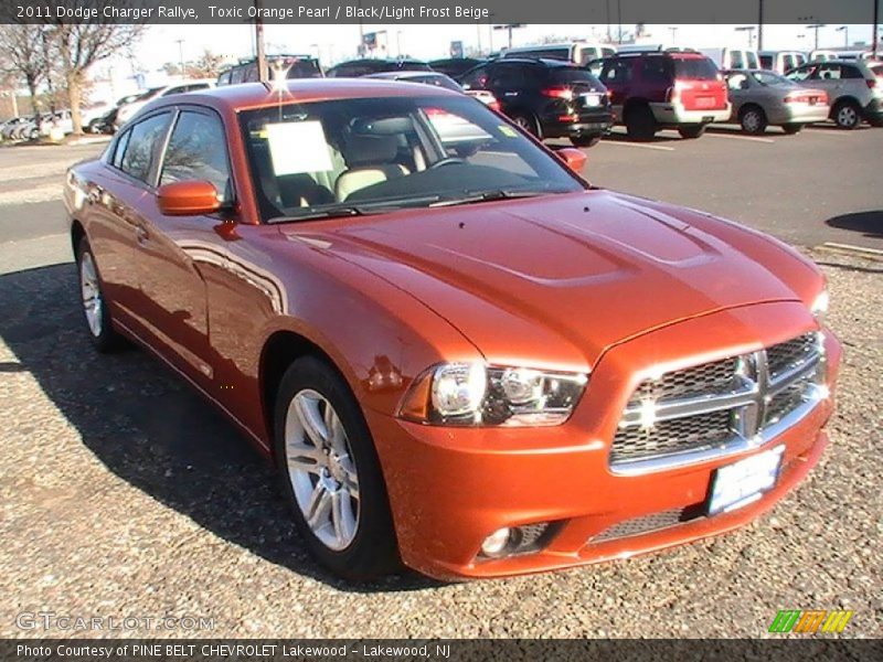 Toxic Orange Pearl / Black/Light Frost Beige 2011 Dodge Charger Rallye
