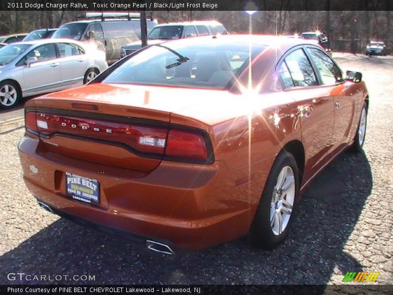 Toxic Orange Pearl / Black/Light Frost Beige 2011 Dodge Charger Rallye
