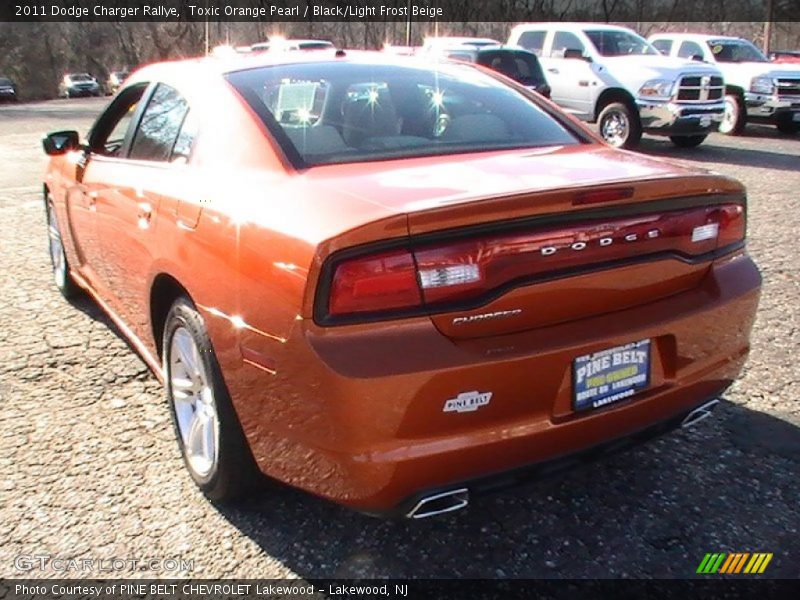 Toxic Orange Pearl / Black/Light Frost Beige 2011 Dodge Charger Rallye