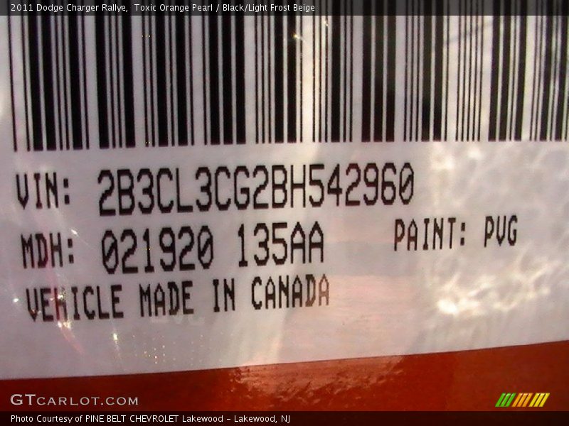 Toxic Orange Pearl / Black/Light Frost Beige 2011 Dodge Charger Rallye