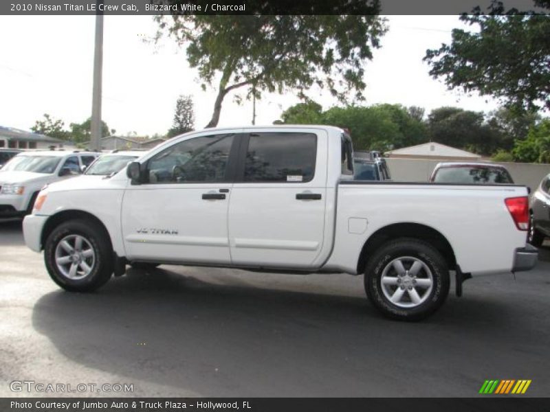 Blizzard White / Charcoal 2010 Nissan Titan LE Crew Cab
