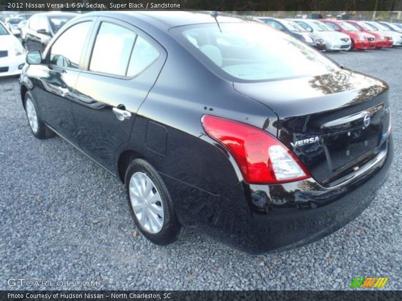 Super Black / Sandstone 2012 Nissan Versa 1.6 SV Sedan