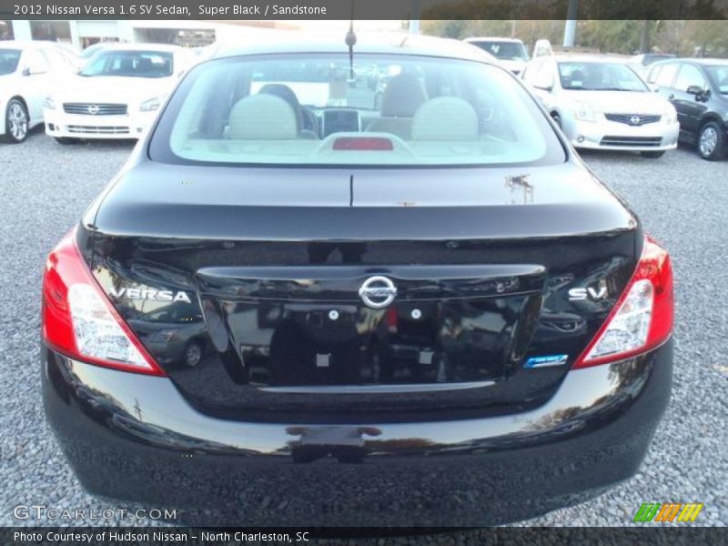 Super Black / Sandstone 2012 Nissan Versa 1.6 SV Sedan