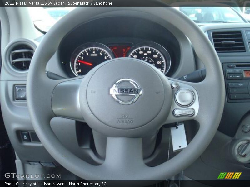 Super Black / Sandstone 2012 Nissan Versa 1.6 SV Sedan