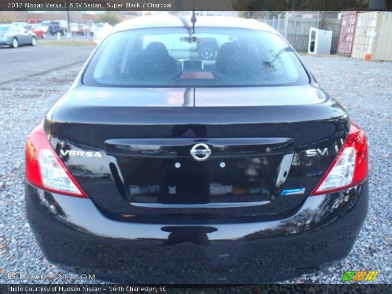 Super Black / Charcoal 2012 Nissan Versa 1.6 SV Sedan