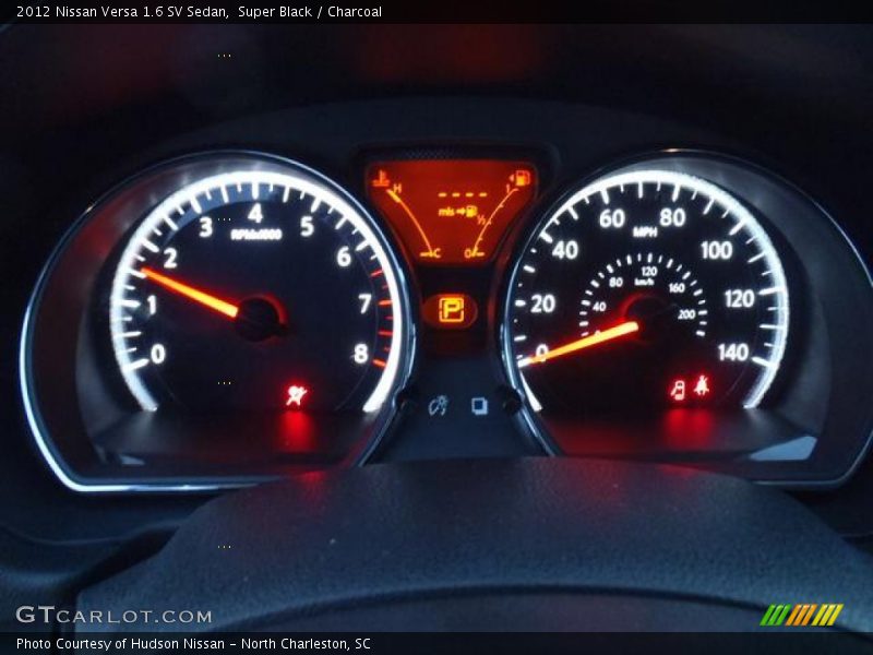 Super Black / Charcoal 2012 Nissan Versa 1.6 SV Sedan