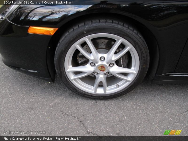 Black / Black 2009 Porsche 911 Carrera 4 Coupe