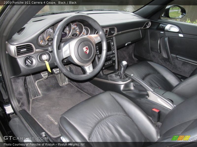 Black / Black 2009 Porsche 911 Carrera 4 Coupe