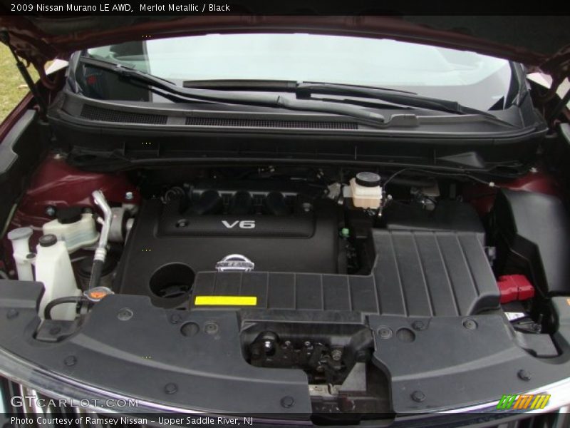 Merlot Metallic / Black 2009 Nissan Murano LE AWD