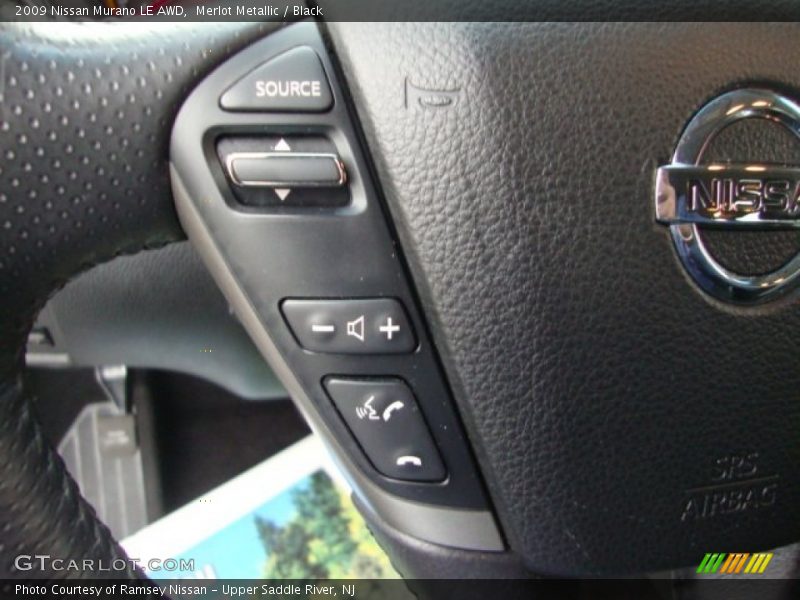 Merlot Metallic / Black 2009 Nissan Murano LE AWD