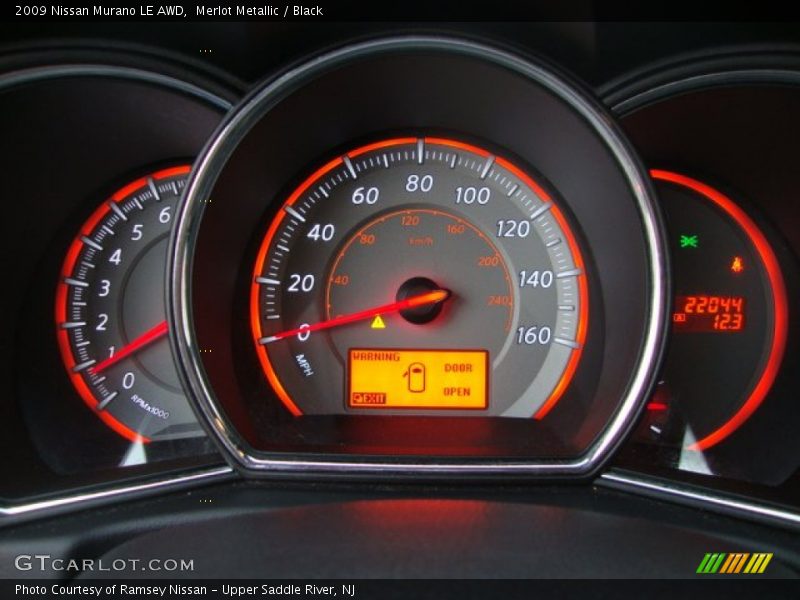Merlot Metallic / Black 2009 Nissan Murano LE AWD