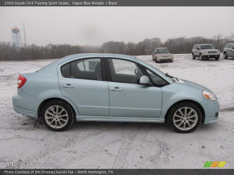 Vapor Blue Metallic / Black 2009 Suzuki SX4 Touring Sport Sedan