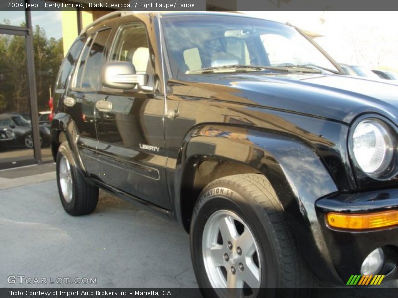 Black Clearcoat / Light Taupe/Taupe 2004 Jeep Liberty Limited