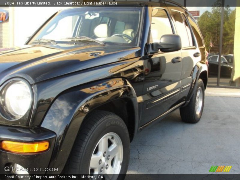 Black Clearcoat / Light Taupe/Taupe 2004 Jeep Liberty Limited