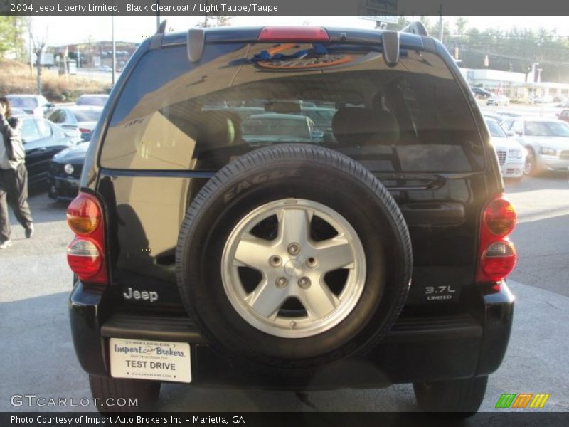 Black Clearcoat / Light Taupe/Taupe 2004 Jeep Liberty Limited