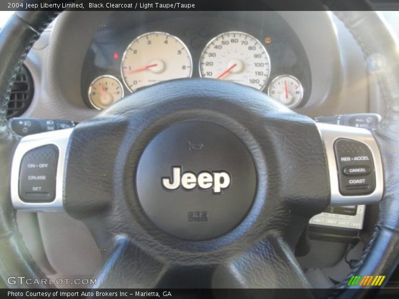 Black Clearcoat / Light Taupe/Taupe 2004 Jeep Liberty Limited