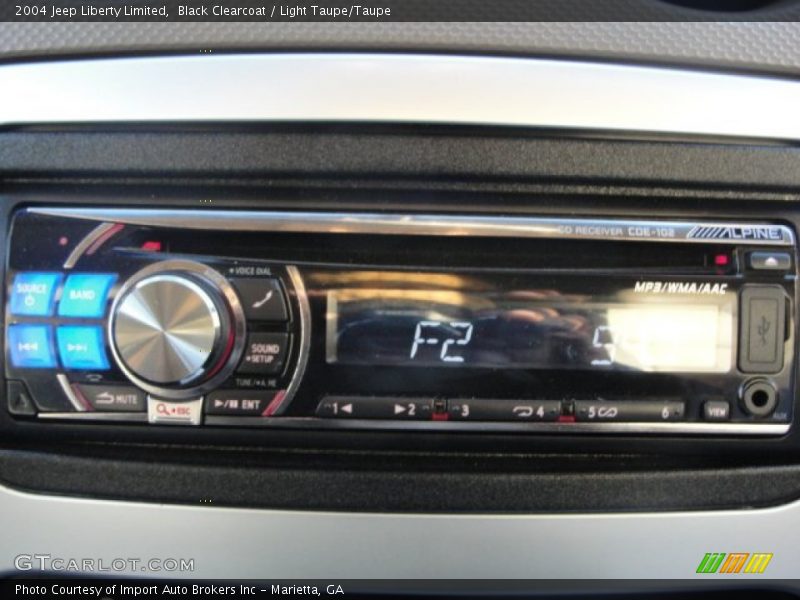 Black Clearcoat / Light Taupe/Taupe 2004 Jeep Liberty Limited