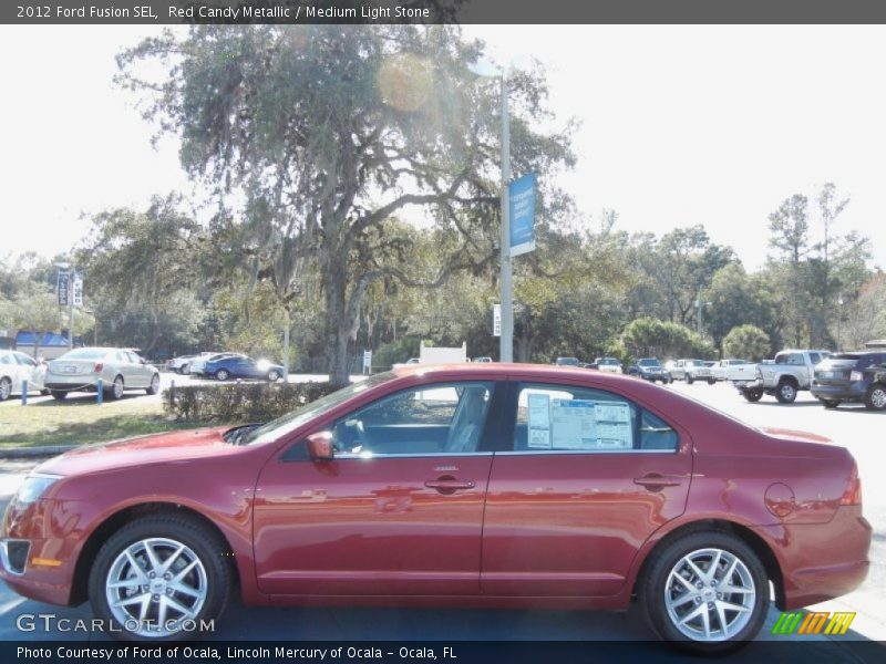 Red Candy Metallic / Medium Light Stone 2012 Ford Fusion SEL