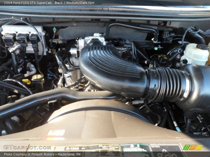 Black / Medium/Dark Flint 2004 Ford F150 STX SuperCab