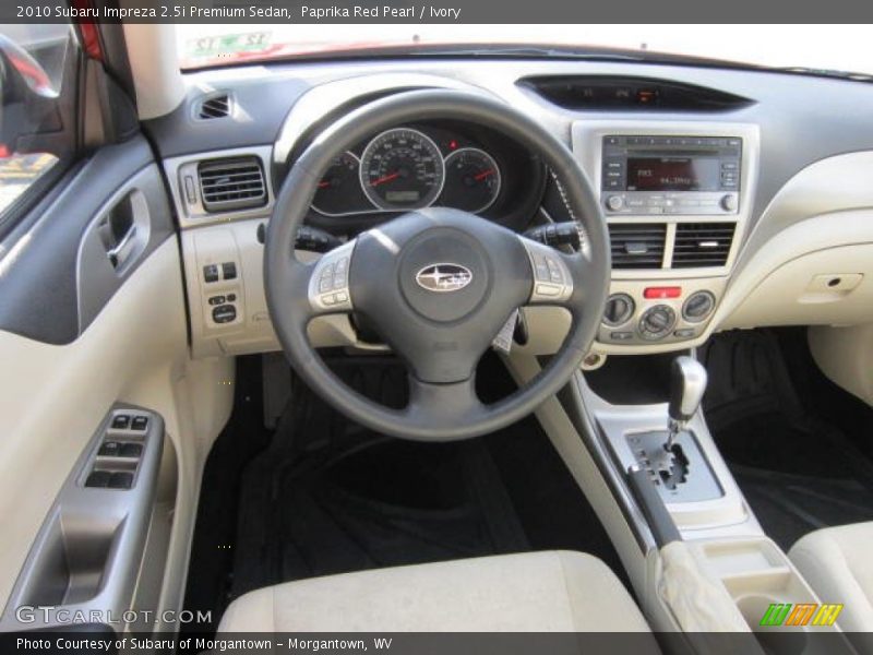 Paprika Red Pearl / Ivory 2010 Subaru Impreza 2.5i Premium Sedan