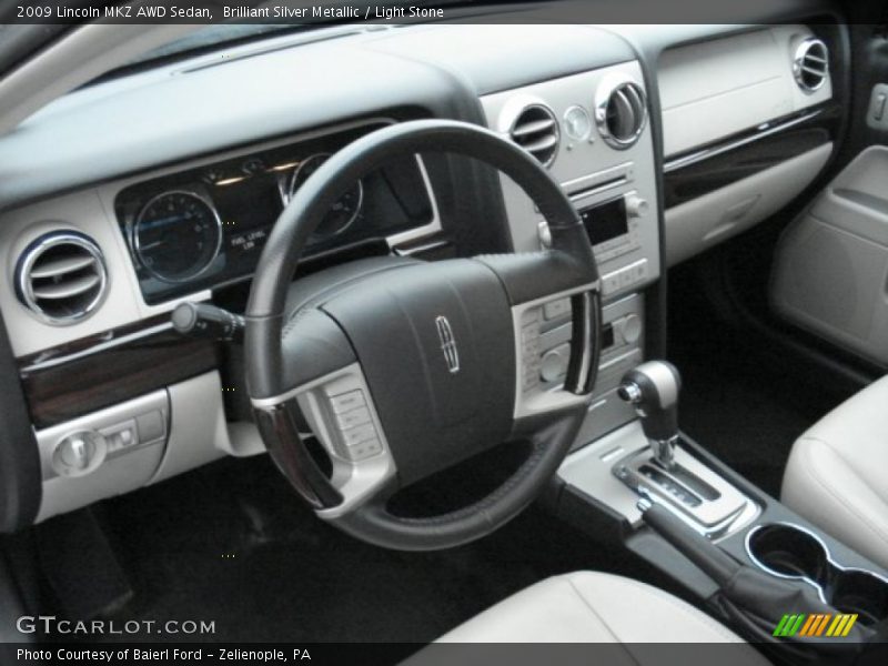 Brilliant Silver Metallic / Light Stone 2009 Lincoln MKZ AWD Sedan