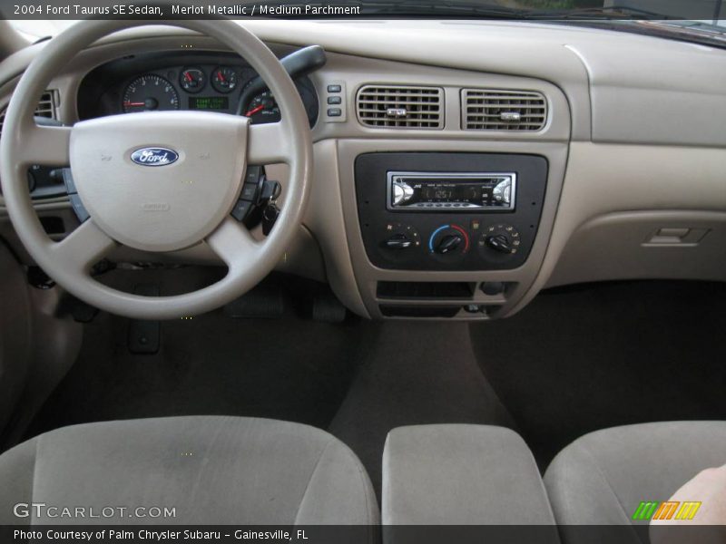 Merlot Metallic / Medium Parchment 2004 Ford Taurus SE Sedan