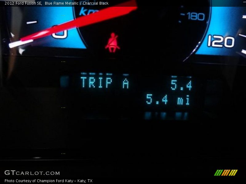 Blue Flame Metallic / Charcoal Black 2012 Ford Fusion SE