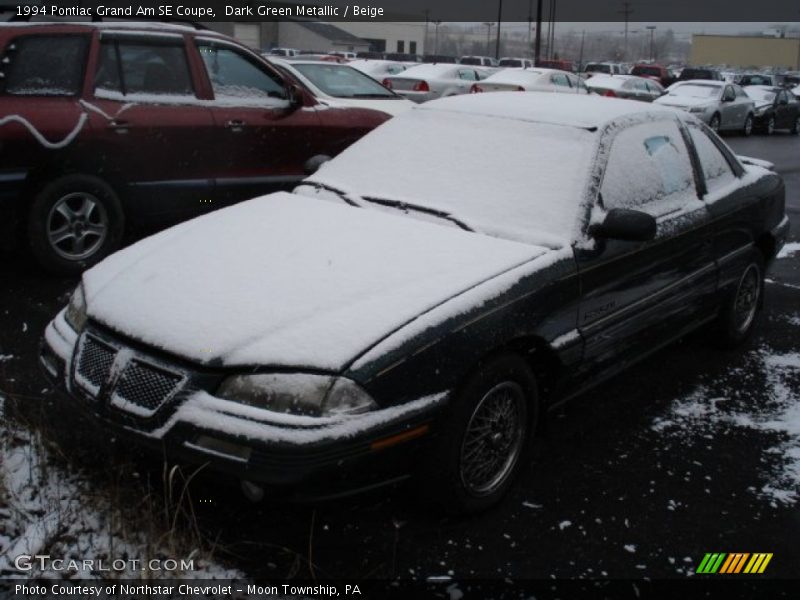 Dark Green Metallic / Beige 1994 Pontiac Grand Am SE Coupe