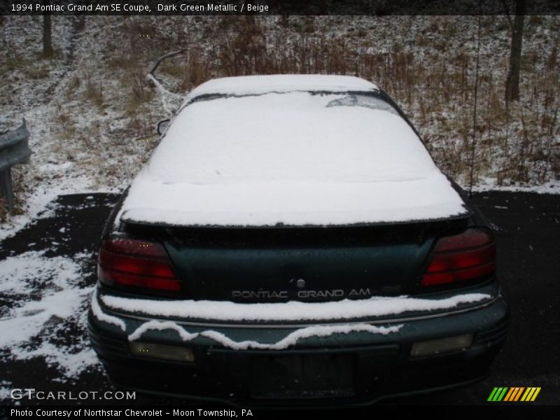 Dark Green Metallic / Beige 1994 Pontiac Grand Am SE Coupe