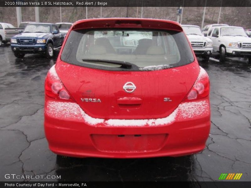 Red Alert / Beige 2010 Nissan Versa 1.8 SL Hatchback