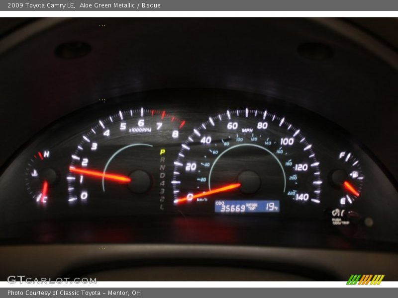 Aloe Green Metallic / Bisque 2009 Toyota Camry LE