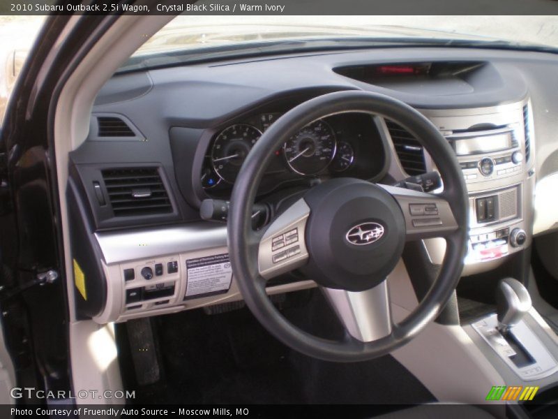 Crystal Black Silica / Warm Ivory 2010 Subaru Outback 2.5i Wagon