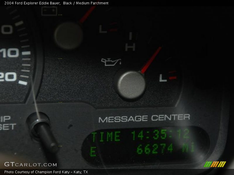 Black / Medium Parchment 2004 Ford Explorer Eddie Bauer