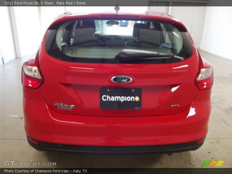 Race Red / Stone 2012 Ford Focus SEL 5-Door